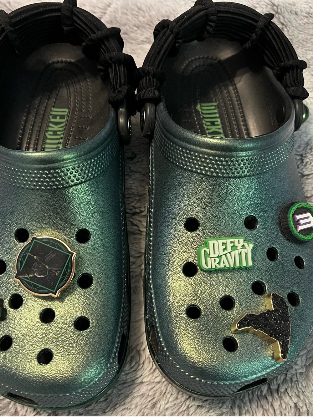 CROCS Women's Iridescent Green Metallic Clogs with Charms